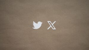 a close up of a piece of paper with a twitter logo on it