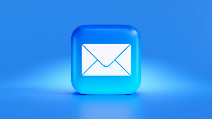 A blue 3D square with a white envelope icon, often representing an email or messaging app, set against a blue background—a vital tool for B2B marketers striving to enhance ROI.