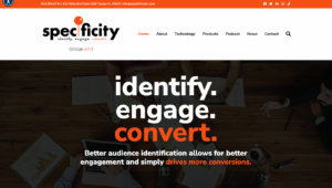 Specificity website homepage, featuring the tagline "identify. engage. convert." with a highlighted message about better audience identification driving more conversions.