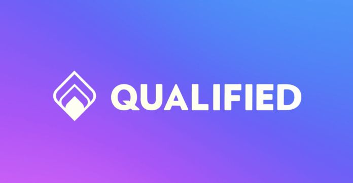 Logo with a white geometric symbol in the spotlight next to the word "QUALIFIED" in bold white letters on a blue to purple gradient background. Spotlight